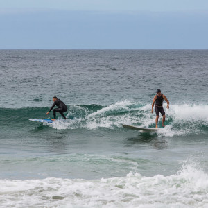 Surfer am Zuma Beach Surfer am Zuma Beach