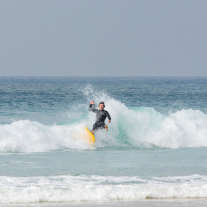Surfer an der Chapelporth Bay Surfer an der Chapelporth Bay